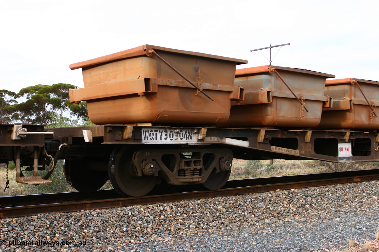 060527 4135
Scotia, WQTY 30304 flat waggon, originally built by Tomlinson Steel WA as WFX type in 1969 from a batch of one hundred and sixty one waggons, recoded to WQCX type in 1979, then to RQHX in 1994, to current code in 1996. Seen here carrying six loaded nickel ore kibbles.
Keywords: WQTY-type;WQTY30304;Tomlinson-Steel-WA;WFX-type;WQCX-type;RQHX-type;