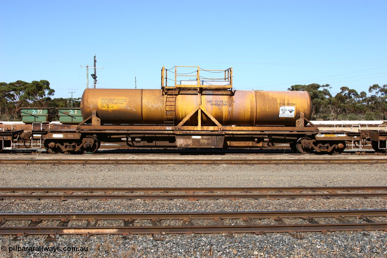 060528 4412
West Kalgoorlie, AQHY 30020 with sulphuric acid tank CSA 0075, originally built by the WAGR Midland Workshops in 1964/66 as a WF type flat waggon, then in 1997, following several recodes and modifications, was one of seventy five waggons converted to the WQH type to carry CSA sulphuric acid tanks between Hampton/Kalgoorlie and Perth/Kwinana.
Keywords: AQHY-type;AQHY30020;WAGR-Midland-WS;WF-type;WFDY-type;WFDF-type;WQH-type;