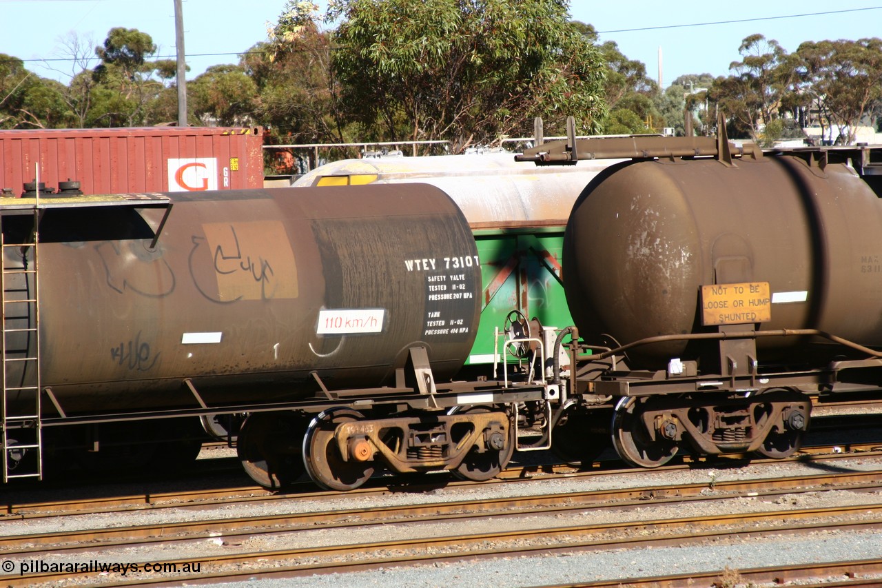 060528 4511
West Kalgoorlie, WTEY 7310 diesel fuel tank waggon, former NTAF in service for BP Oil, former AMPOL tank, coded WTEY when arrived in WA. End detail.
Keywords: WTEY-type;WTEY7310;NTAF-type;