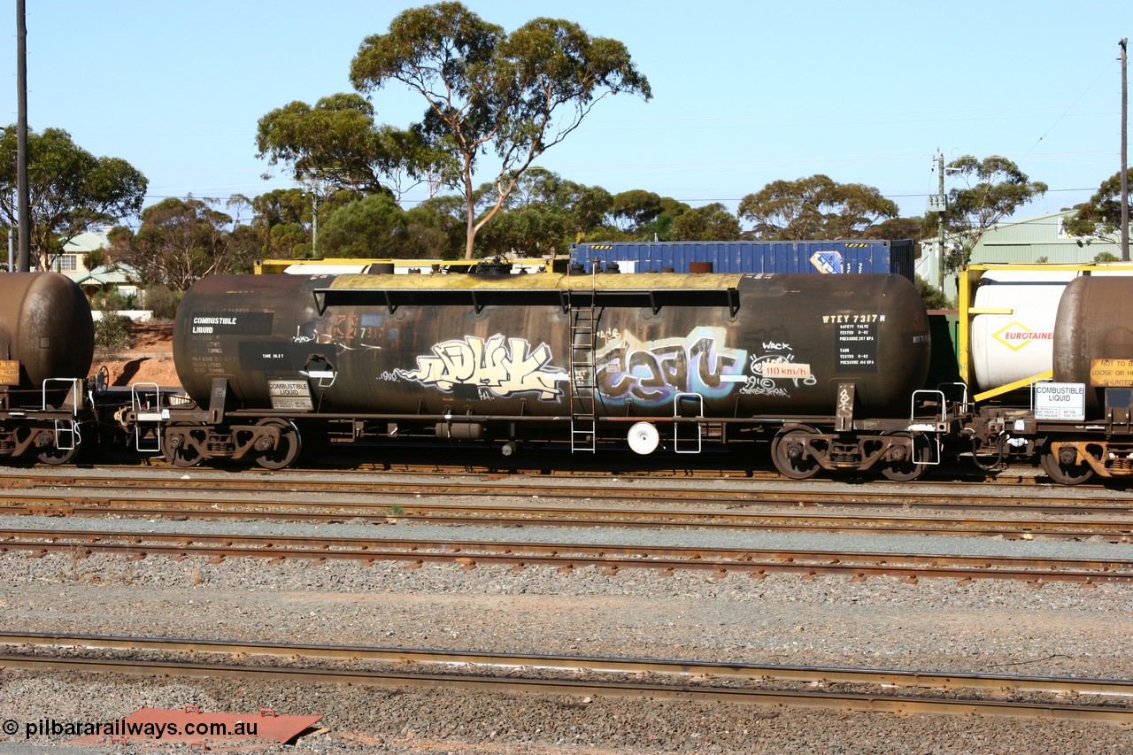 060528 4512 WTEY7317N
West Kalgoorlie, WTEY 7317 diesel fuel tank waggon, former NTAF in service for BP Oil, former AMPOL tank, coded WTEY when arrived in WA.
Keywords: WTEY-type;WTEY7317;NTAF-type;