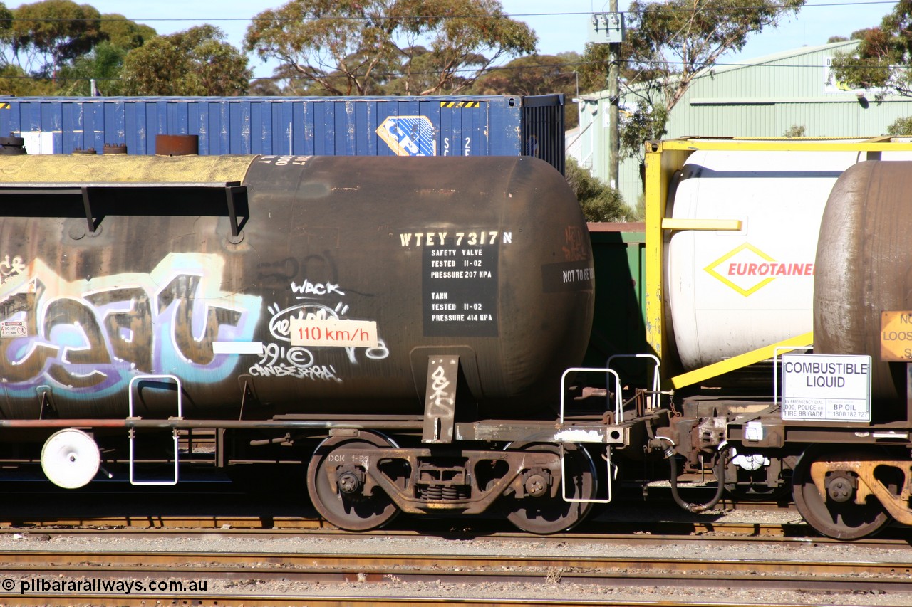 060528 4513
West Kalgoorlie, WTEY 7317 diesel fuel tank waggon, former NTAF in service for BP Oil, former AMPOL tank, coded WTEY when arrived in WA. End detail.
Keywords: WTEY-type;WTEY7317;NTAF-type;