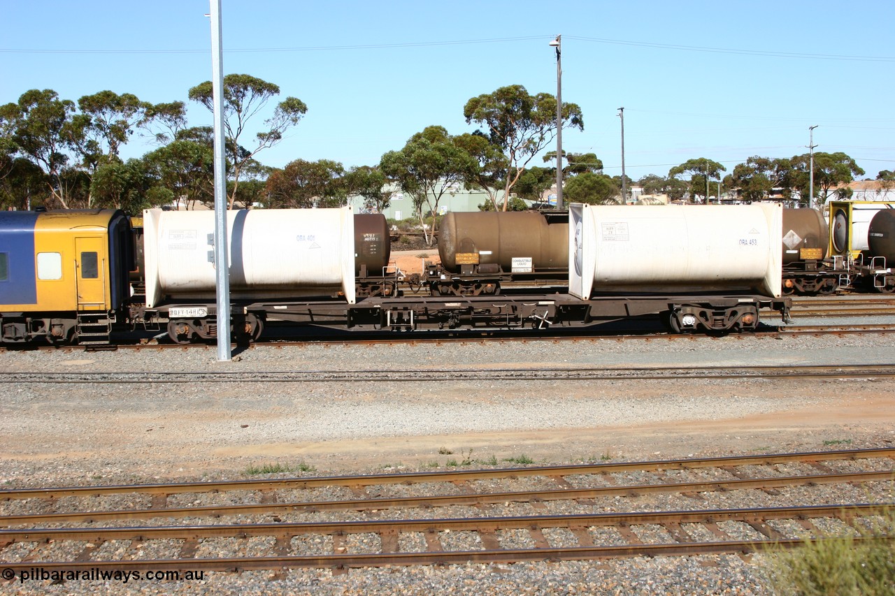 060528 4518
West Kalgoorlie, RQFY 14 loaded with two Orica ORA tanktainers and riding on NSW type bogies, built by Victorian Railways Bendigo workshops in April 1978 in a batch of forty QMX type skeletal container waggons, in July 1980 re-coded to VQFX, in October 1994 re-coded to RQFX and 2CM bogies fitted.
Keywords: RQFY-type;RQFY14;Victorian-Railways-Bendigo-WS;QMX-type;VQFX-type;