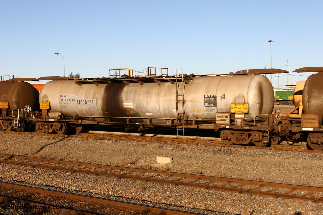 060528 4644 ATPF577Y
West Kalgoorlie, ATPF 577 fuel tank waggon built by WAGR Midland Workshops 1974 for Shell as type WJP, 80.66 kL one compartment one dome, capacity of 80500 litres, fitted with type F InterLock couplers Shell Fleet no. TR712.
Keywords: ATPF-type;ATPF577;WAGR-Midland-WS;WJP-type;