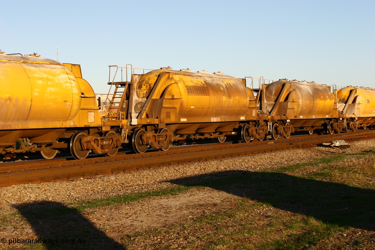 060603 5237
Midland, WNA 31168, final member built by Westrail Midland Workshops in 1979 as WNA class pneumatic discharge nickel concentrate waggon, WAGR built and owned copies of the AE Goodwin built WN waggons for WMC.
Keywords: WNA-type;WNA31168;WAGR-Midland-WS;