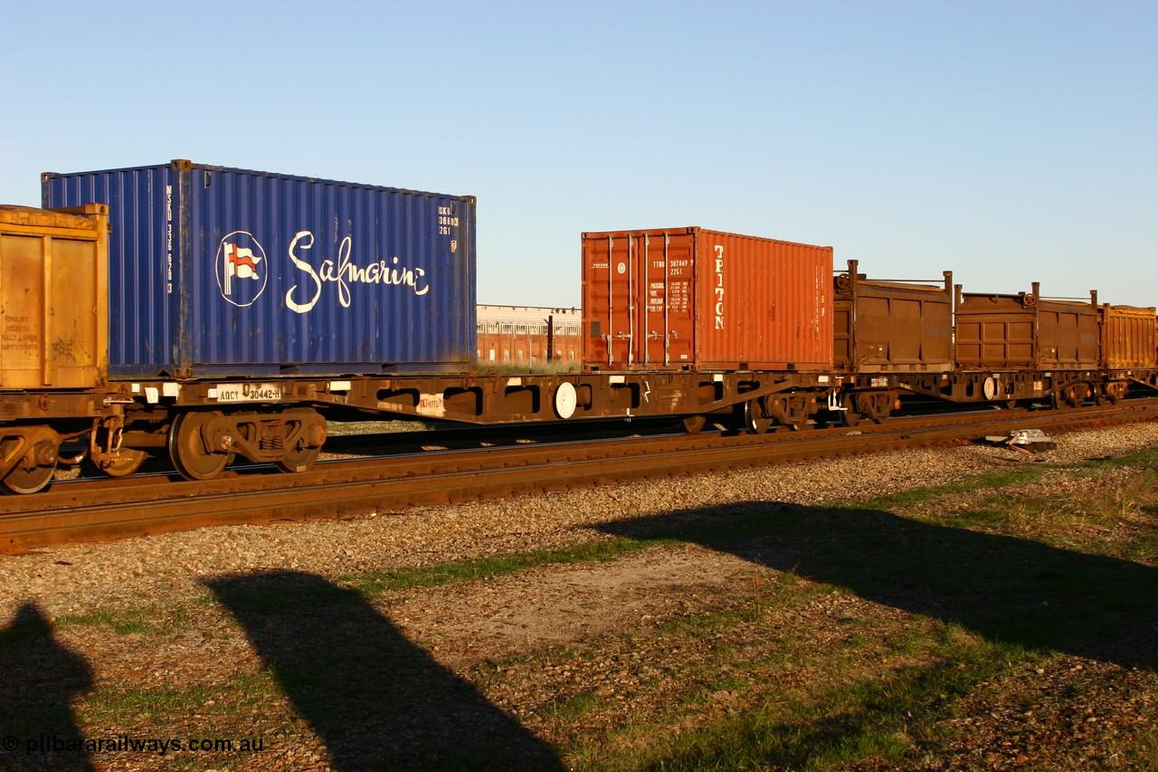 060603 5249
Midland, AQCY 30442 container waggon originally built by Tomlinson Steel WA as WFX type in 1970 from a batch of one hundred and sixty one waggons, recoded to WQCX type in 1980 with two 20' 22G1 type containers Safmarine MSKU 336628 and Triton TTNU 387869.
Keywords: AQCY-type;AQCY30442;Tomlinson-Steel-WA;WFX-type;WQCX-type;