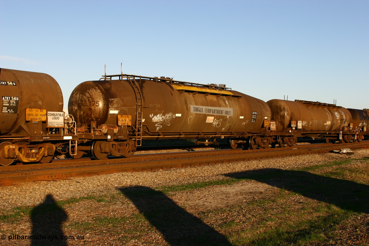 060603 5263 ATJY531J
Midland, ATJY 531 diesel fuel tank waggon built by Comeng NSW in 1971 for AMPOL, the same as a sister tank built at the same time for Caltex both as WJJ type two compartment two dome. Seen here in service with Caltex. 91,000 litres now single compartment.
Keywords: ATJY-type;ATJY531;Comeng-WA;WJJ-type;