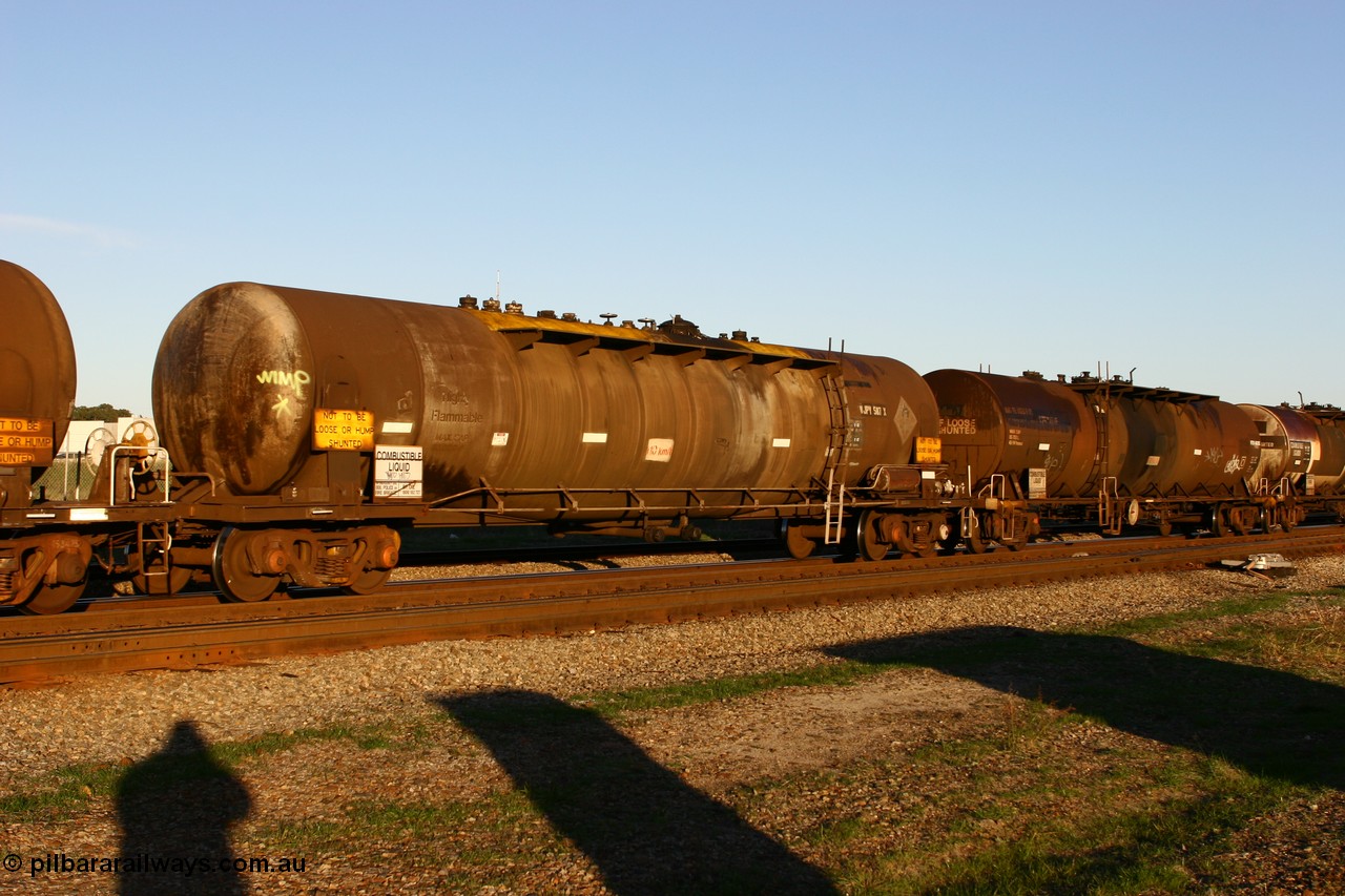 060603 5268 WJPY587X
Midland, diesel fuel tank waggon WJPY 587 built by Westrail Midland Workshops in 1978 for Mobil, later sold to BP, as type WJP, 80.66 kL one compartment one dome, original code and fleet no. visible, with a capacity now of 80000 litres.
Keywords: WJPY-type;WJPY587;WAGR-Midland-WS;WJP-type;