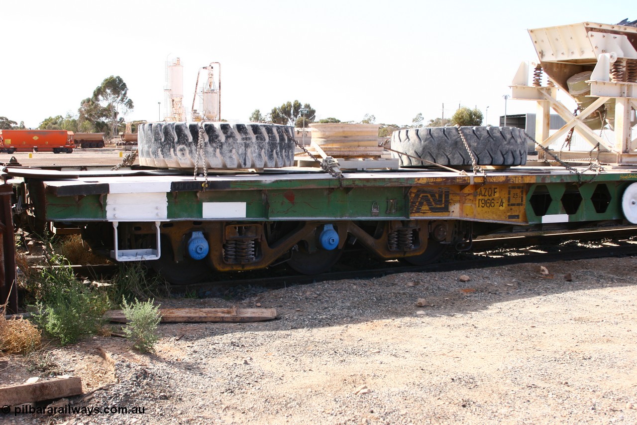 070527 9175
Parkeston, AZQF 1966 heavy weight waggon, originally built by Commonwealth Railways Port Augusta Workshops in November 1966, issued as 1966, coded Q, then later to AZQF, fitted with narrow gauge rails on deck for conveyance of rollingstock between Port Augusta and Marree. View of six wheel bogie and code board.
Keywords: AZQF-type;AZQF1966;CR-Port-Augusta-WS;Q-type;