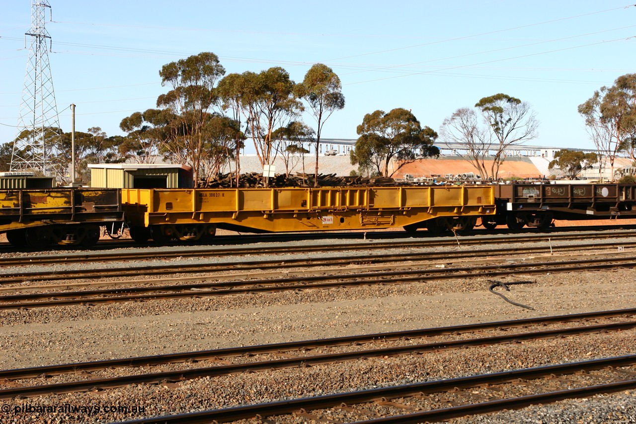 070529 9326
West Kalgoorlie, WGLA 30027 originally built by WAGR Midland Workshops in 1965 as WF type bogie flat waggon, to WFW in 1974, then converted to bagged nickel matte traffic WGLA type in 1984.
Keywords: WGLA-type;WGLA30027;WAGR-Midland-WS;WF-type;WFW-type;WFDY-type;