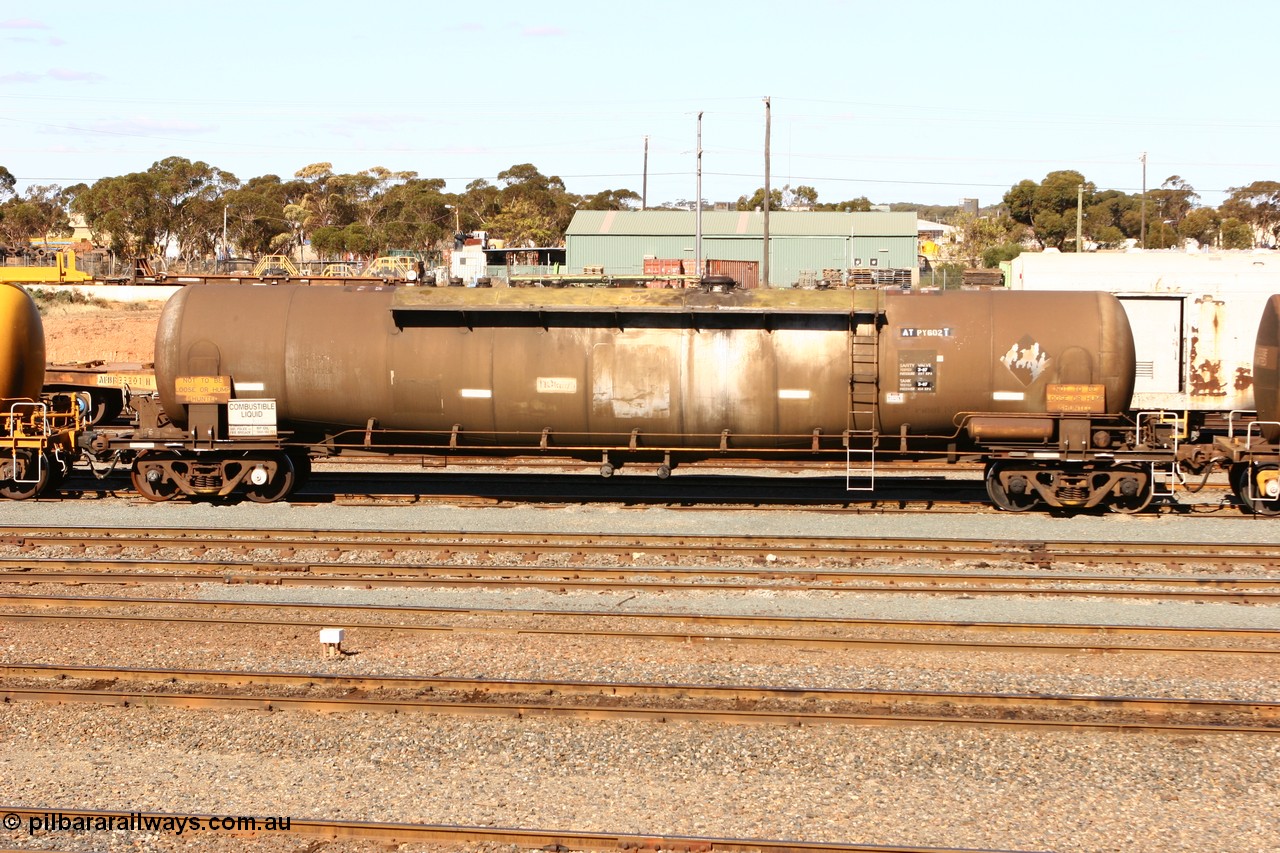 070529 9404
West Kalgoorlie, ATPY 602, fuel tanker, built by WAGR Midland Workshops in 1976 as WJP class for BP Oil, capacity of 80500 litres.
Keywords: APTY-type;ATPY602;Westrail-Midland-WS;WJP-type;WJPY-type;