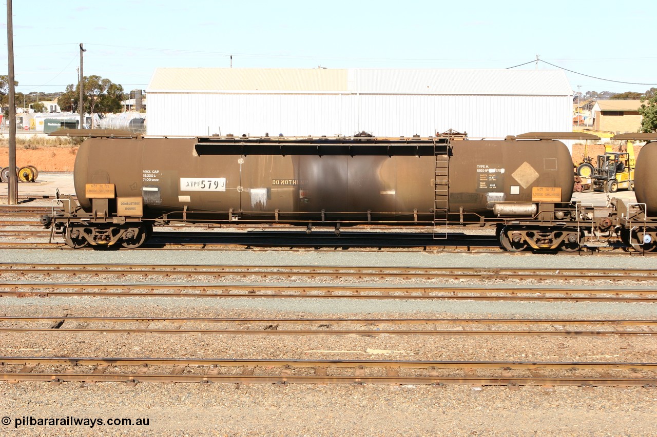 070529 9418
West Kalgoorlie, ATPF 579 fuel tank waggon built by WAGR Midland Workshops 1974 for Shell as WJP type 80.66 kL one compartment one dome, fitted with type F InterLock couplers.
Keywords: ATPF-type;ATPF579;WAGR-Midland-WS;WJP-type;
