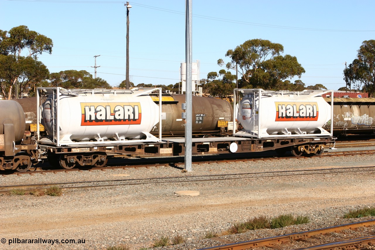 070531 9713
West Kalgoorlie, AQCY 30216 one of a batch of forty five built by WAGR Midland Workshops in 1974 as the WFX type container flat waggons, re-coded in 1979 to WQCX. Loaded with two Jamieson built tanktainers in Kalari cement / lime service.
Keywords: AQCY-type;AQCY30216;WAGR-Midland-WS;WFX-type;WQCX-type;