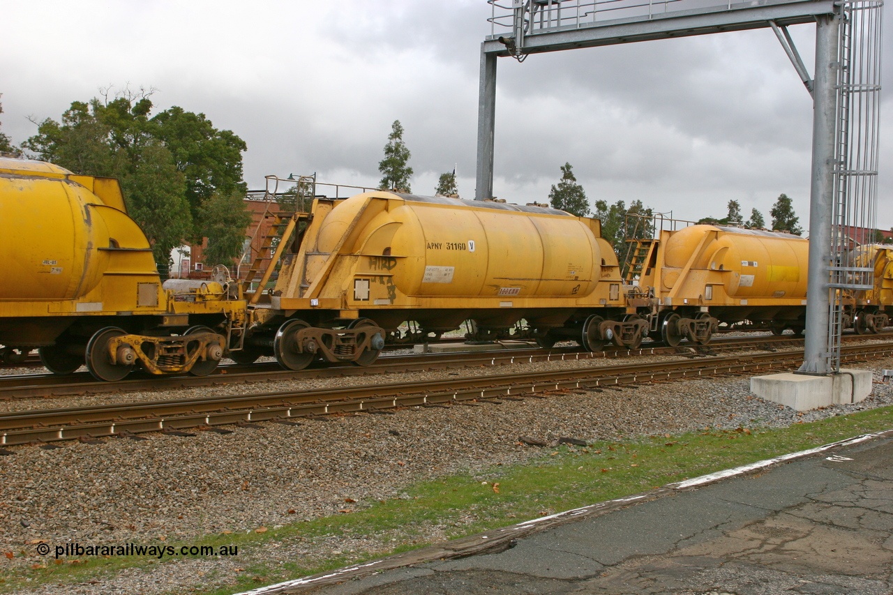 070608 0091
Midland, APNY 31160, one of twelve built by WAGR Midland Workshops in 1974 as WNA type pneumatic discharge nickel concentrate waggon, WAGR built and owned copies of the AE Goodwin built WN waggons for WMC.
Keywords: APNY-type;APNY31160;Westrail-Midland-WS;WNA-type;