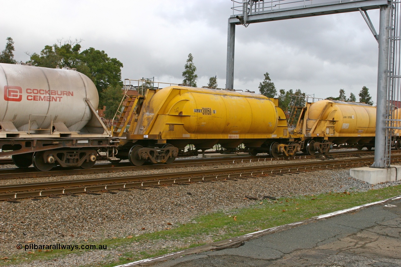 070608 0092
Midland, APNY 31151, one of twelve built by WAGR Midland Workshops in 1974 as WNA type pneumatic discharge nickel concentrate waggon, WAGR built and owned copies of the AE Goodwin built WN waggons for WMC.
Keywords: APNY-type;APNY31151;Westrail-Midland-WS;WNA-type;