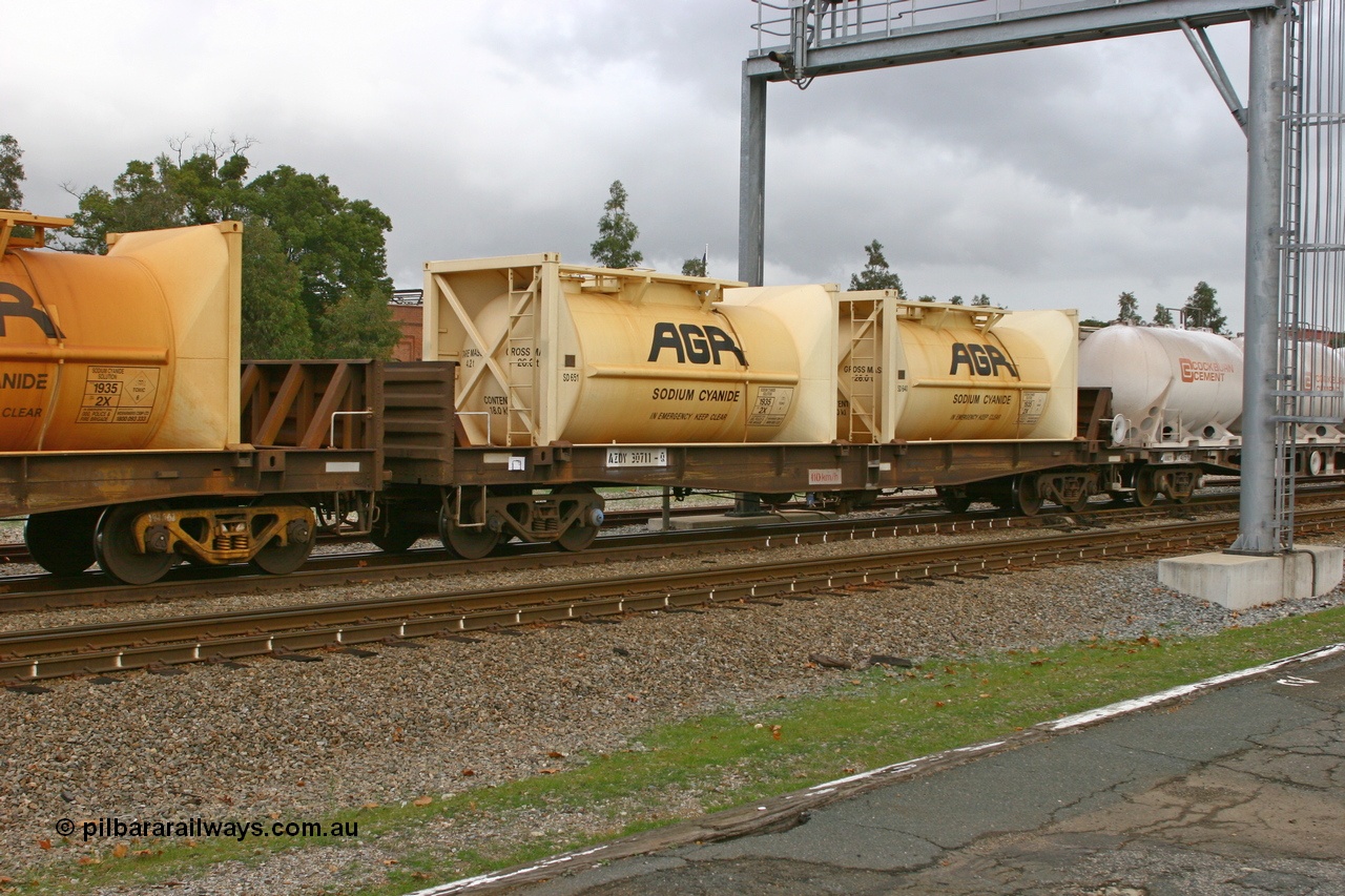 070608 0101
Midland, AZDY 30711, one of about fourteen WBAX vans converted to AZDY type sodium cyanide container waggon, originally built by WAGR Midland Workshops as one of seventy five WV/X type covered vans in 1967-68, converted late 1988/9 to WQDF.
Keywords: AZDY-type;AZDY30711;WAGR-Midland-WS;WVX-type;WBAX-type;WQDF-type;WQDY-type;