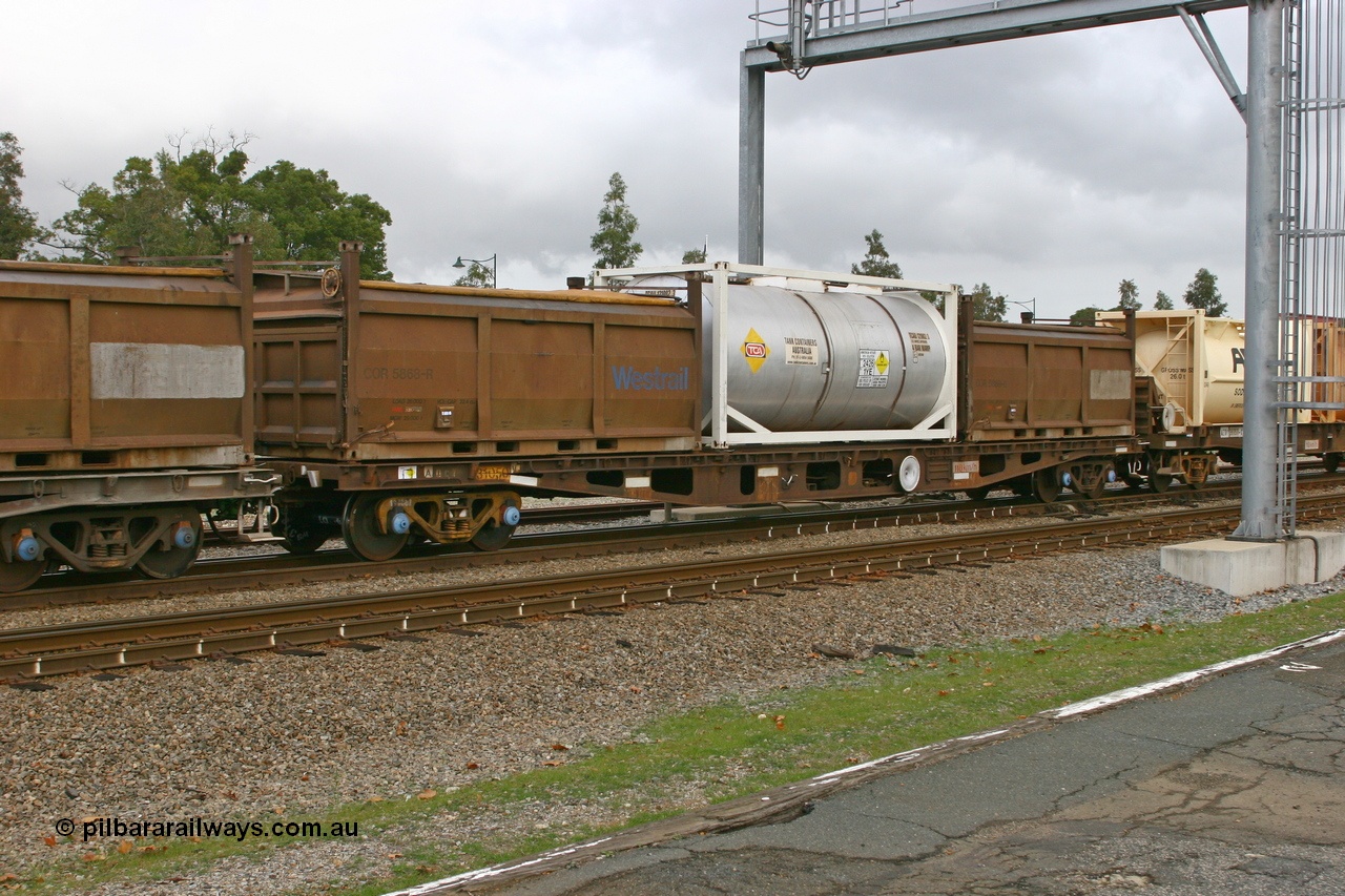 070608 0103
Midland, AQCY 31050, built by Centrecon Ltd WA in 1981 in a batch of thirty five WFA type container waggons, another eighteen were also built by Westrail. Recoded to WQCY 1987, then RHQY and back to WQCY in 1995. Loaded with two Westrail COR roll top containers COR 5868 and COR 5888 and a 20' ISO Tank Containers Australia tanktainer TCAU 121002 with ammonium nitrate emulsion.
Keywords: AQCY-type;AQCY31050;Centrecon-Ltd-WA;WFA-type;WQCY-type;RHQY-type;