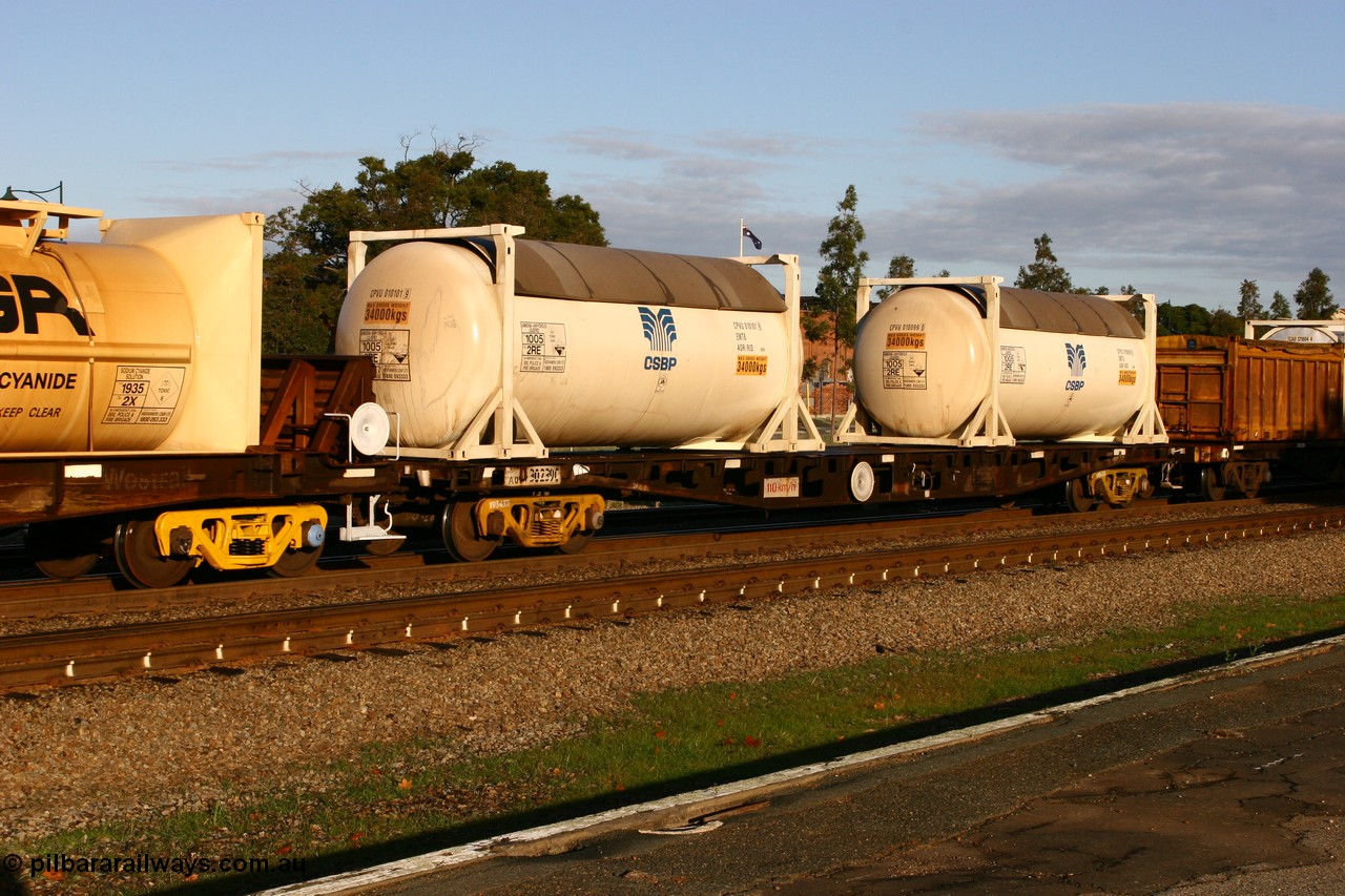 070609 0184
Midland, AQCY 30239 container flat waggon built by Westrail Midland Workshops in 1974 part of a batch of forty five WFX type container flat waggons, in 1979 recoded to WQCX with two 30' CSBP tanktainers CPVU 010101 and CPVU 010099 for liquefied ammonia anhydrous.
Keywords: AQCY-type;AQCY30239;WAGR-Midland-WS;WFX-type;WQCX-type;