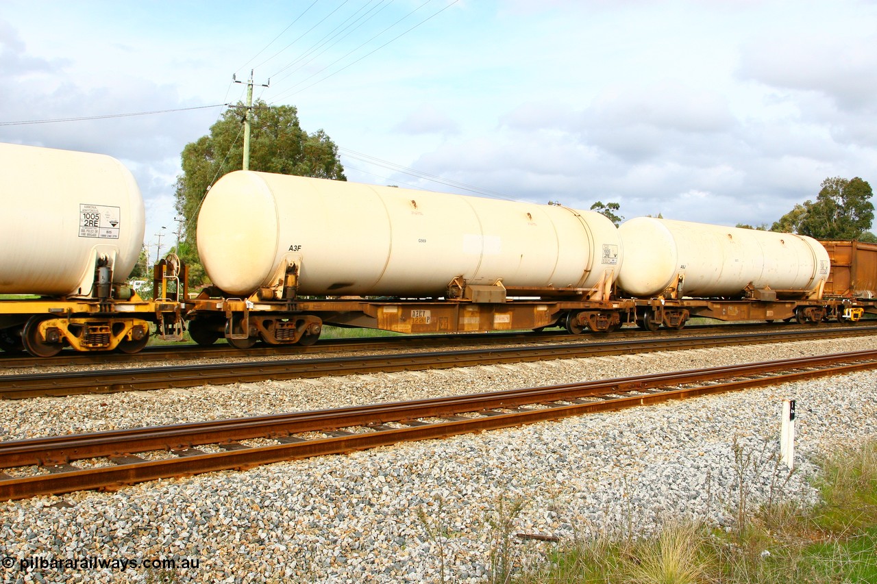 070613 0057
Woodbridge, AZKY type anhydrous ammonia tank waggon AZKY 32241, one of twelve built by Goninan WA in 1998 as WQK type for Murrin Murrin traffic, fitted with Brambles anhydrous ammonia tank A3F with no signage.
Keywords: AZKY-type;AZKY32241;Goninan-WA;WQK-type;