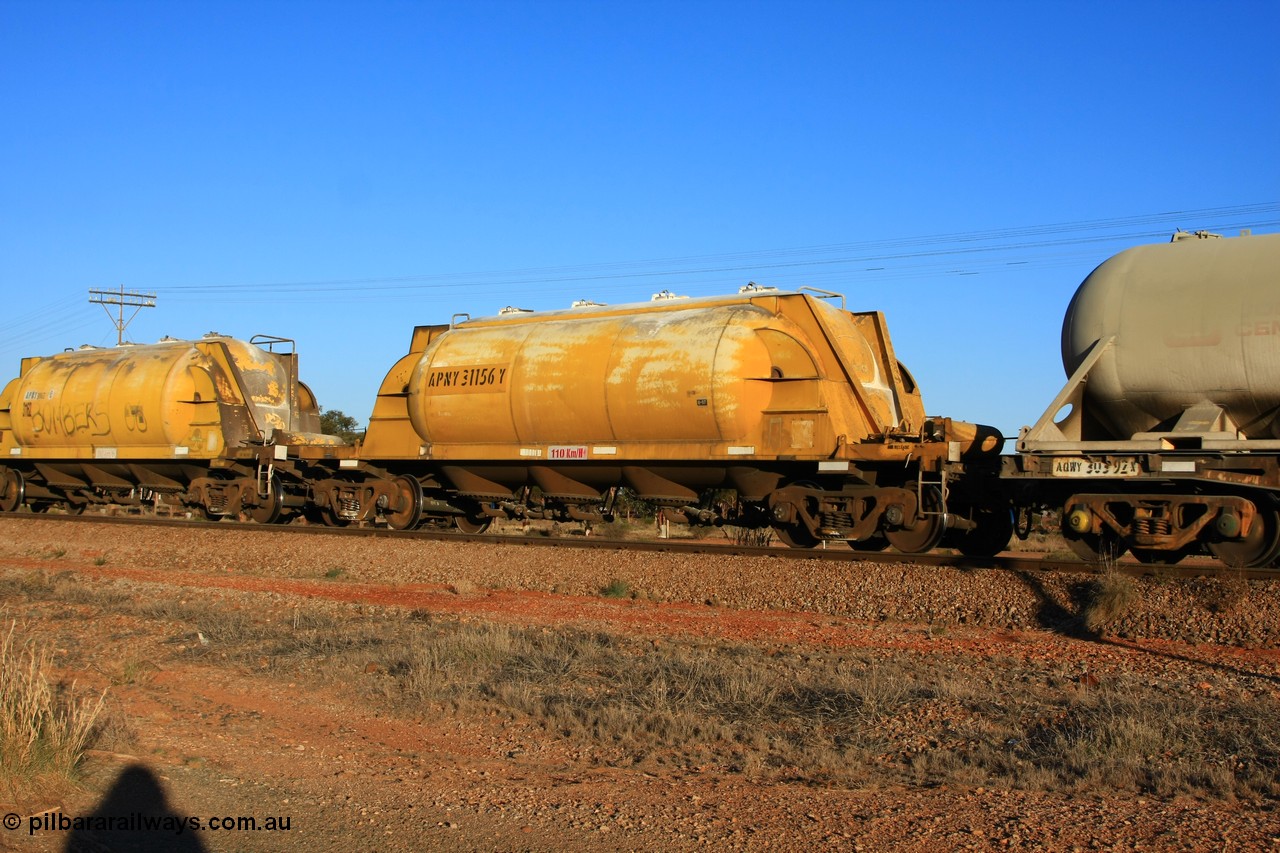 100601 8518
Parkeston, APNY 31156, one of twelve units built by WAGR Midland Workshops in 1974 as WNA type pneumatic discharge nickel concentrate waggon, WAGR units built and owned copies of the AE Goodwin units built WN waggons for WMC.
Keywords: APNY-type;APNY31156;WAGR-Midland-WS;WNA-type;