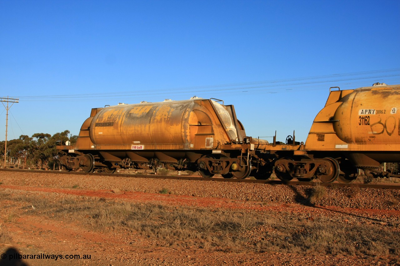 100601 8520
Parkeston, APNY 31154, one of twelve units built by WAGR Midland Workshops in 1974 as WNA type pneumatic discharge nickel concentrate waggon, WAGR units built and owned copies of the AE Goodwin units built WN waggons for WMC.
Keywords: APNY-type;APNY31154;WAGR-Midland-WS;WNA-type;