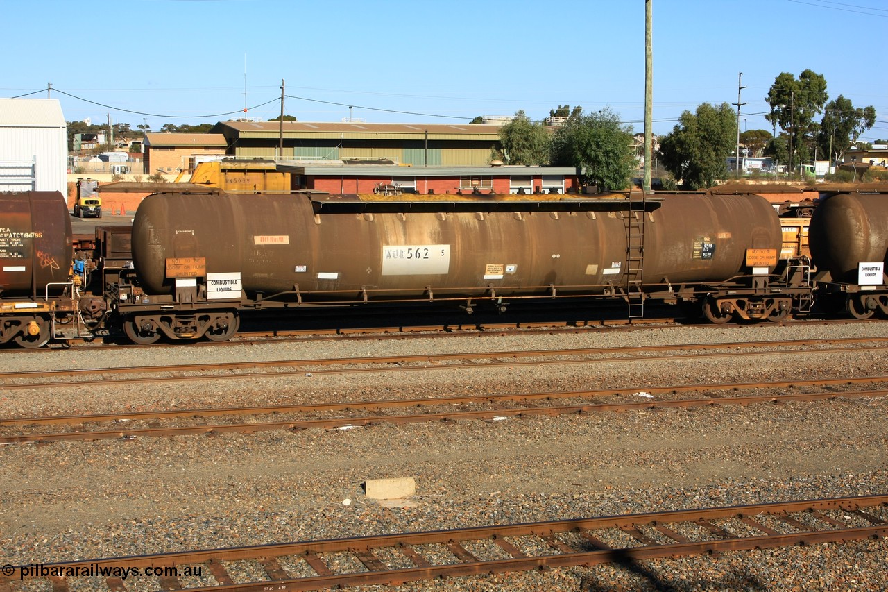 100602 8671
West Kalgoorlie, ATLF 562 tank waggon, built by WAGR Midland Workshops 1973 for Shell as type WJL 86.49 kL one compartment one dome with a capacity of 80500 litres, fitted with type F InterLock couplers.
Keywords: ATLF-type;ATLF562;WAGR-Midland-WS;WJL-type;