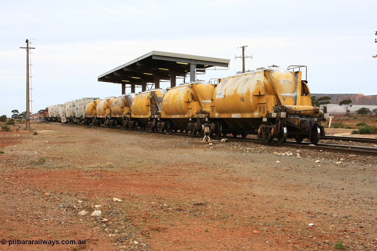 100605 9111
Parkeston, APNY waggons on the rear of C73 trip train about to reverse into Cockburn Lime works sidings. Built by WAGR Midland Workshops in 1974-80 as WNA type pneumatic discharge nickel concentrate waggon, WAGR built and owned copies of the AE Goodwin built WN waggons for WMC. 
Keywords: APNY-type;Westrail-Midland-WS;WNA-type;