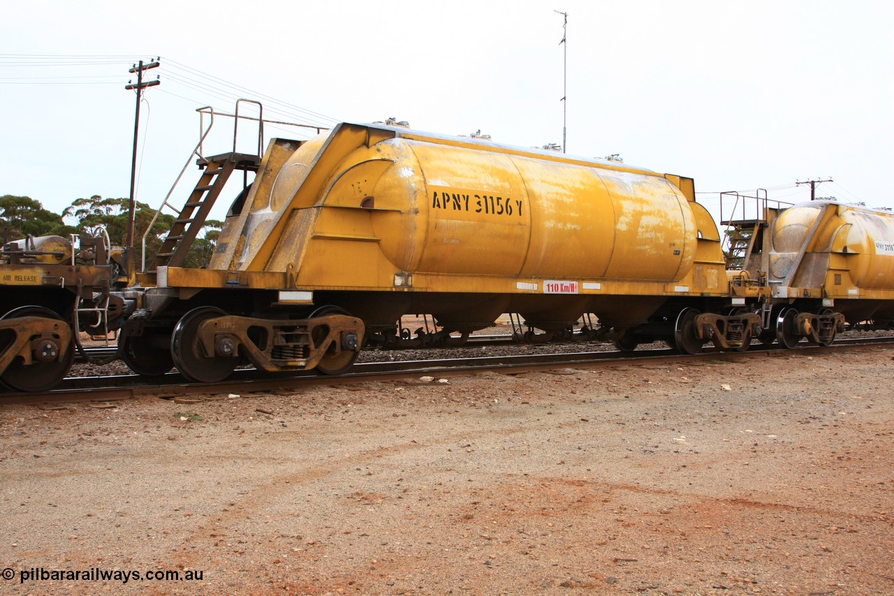 100605 9113
Parkeston, APNY 31156, one of twelve built by WAGR Midland Workshops in 1974 as WNA type pneumatic discharge nickel concentrate waggon, WAGR built and owned copies of the AE Goodwin built WN waggons for WMC.
Keywords: APNY-type;APNY31156;WAGR-Midland-WS;WNA-type;