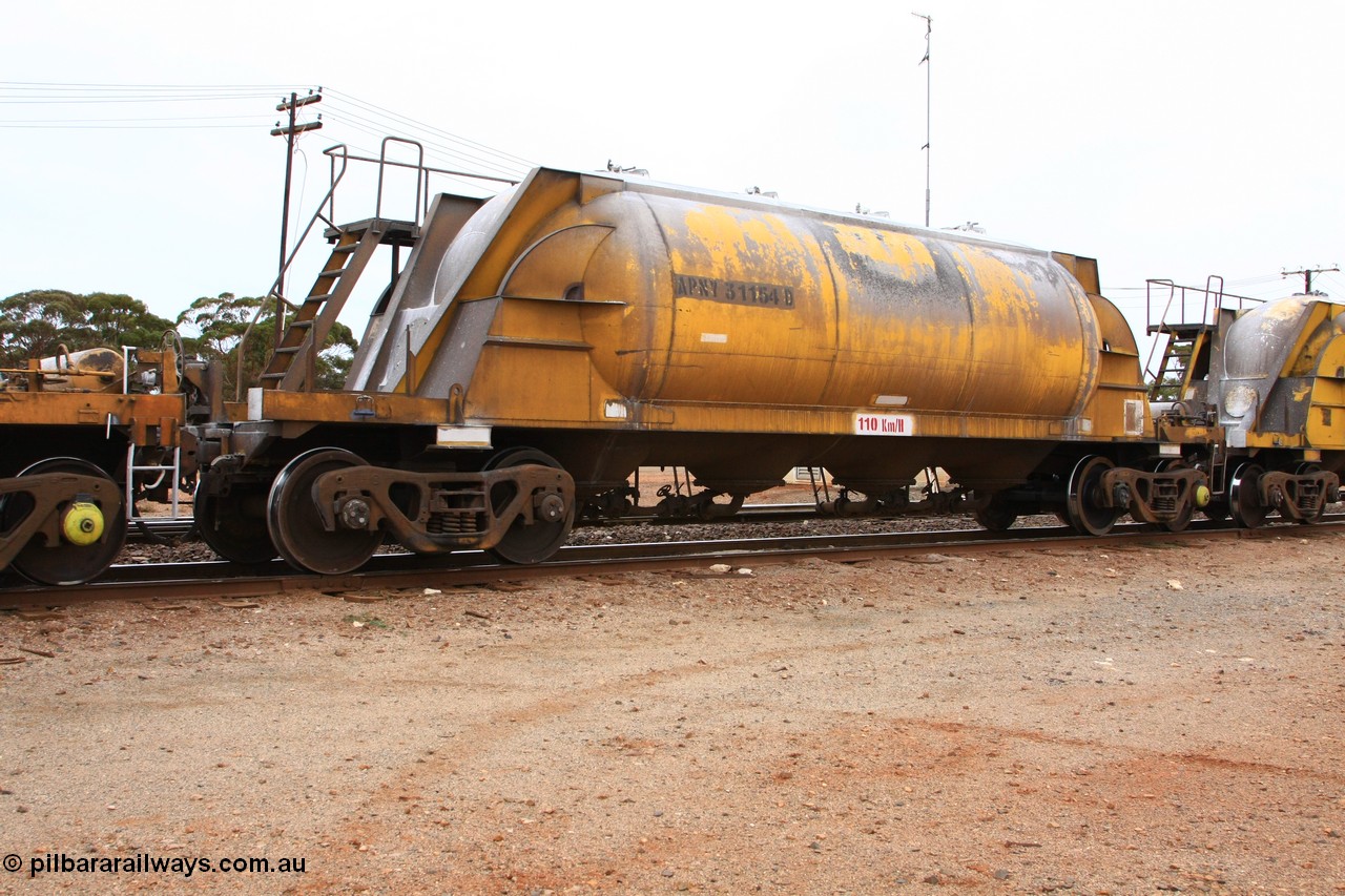 100605 9115
Parkeston, APNY 31154, one of twelve built by WAGR Midland Workshops in 1974 as WNA class pneumatic discharge nickel concentrate waggon, WAGR built and owned copies of the AE Goodwin built WN waggons for WMC.
Keywords: APNY-type;APNY31154;WAGR-Midland-WS;WNA-type;