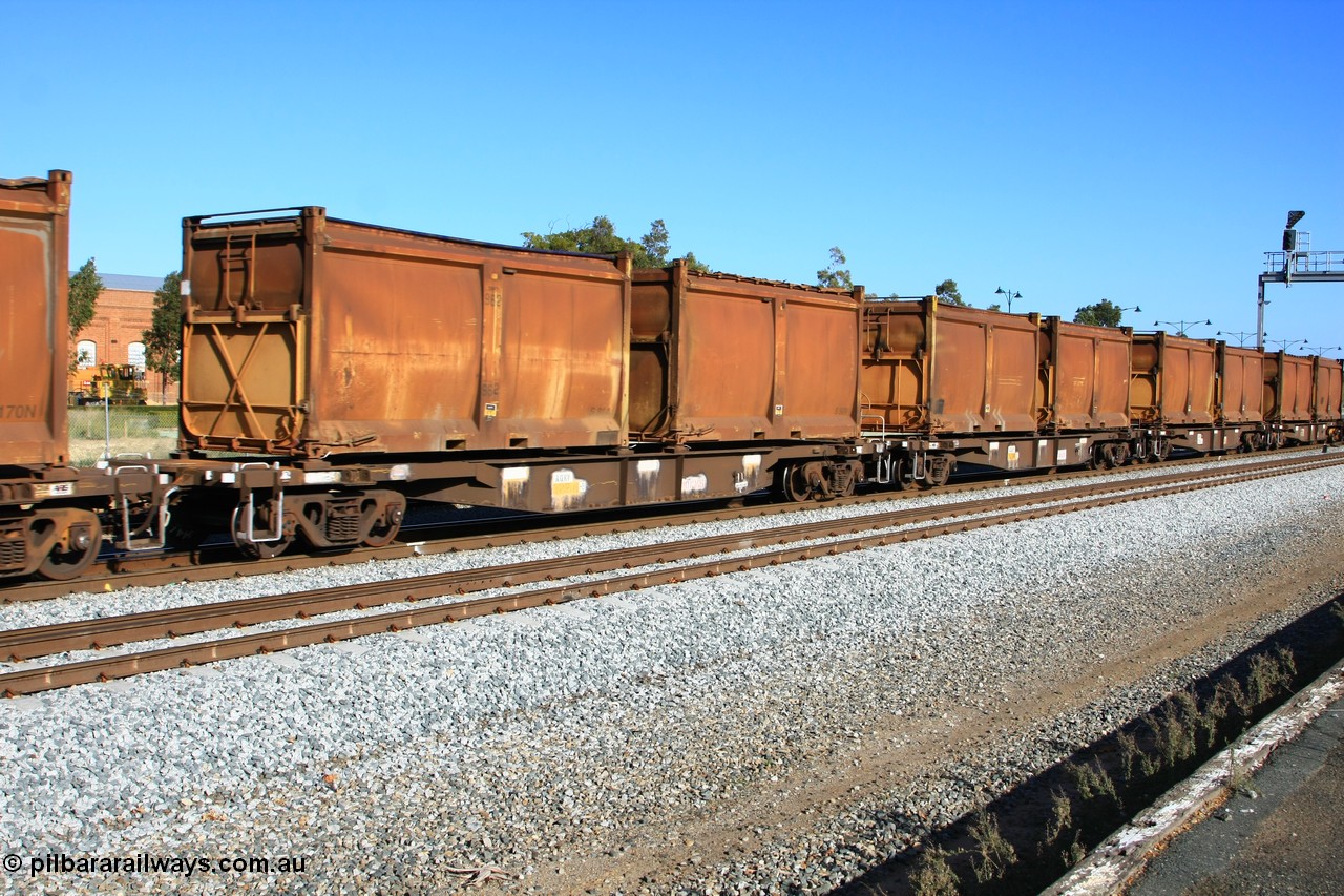 100608 9712
Midland, AQNY 32204, one of sixty two waggons built by Goninan WA in 1998 as WQN class for Murrin Murrin container traffic, with sulphur skips S81A with a replacement lower door and roll top tarpaulin and S90W in original condition on train 2430 empty Malcolm freighter.
Keywords: AQNY-type;AQNY32204;Goninan-WA;WQN-type;