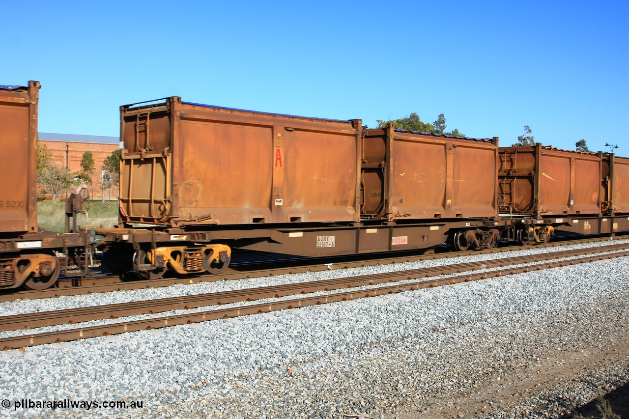 100608 9732
Midland, AQNY 32167, one of sixty two waggons built by Goninan WA in 1998 as WQN class for Murrin Murrin container traffic, with sulphur skips S153B with replacement door and roll top tarpaulin and S140M in original condition on train 2430 empty Malcolm freighter.
Keywords: AQNY-type;AQNY32167;Goninan-WA;WQN-type;