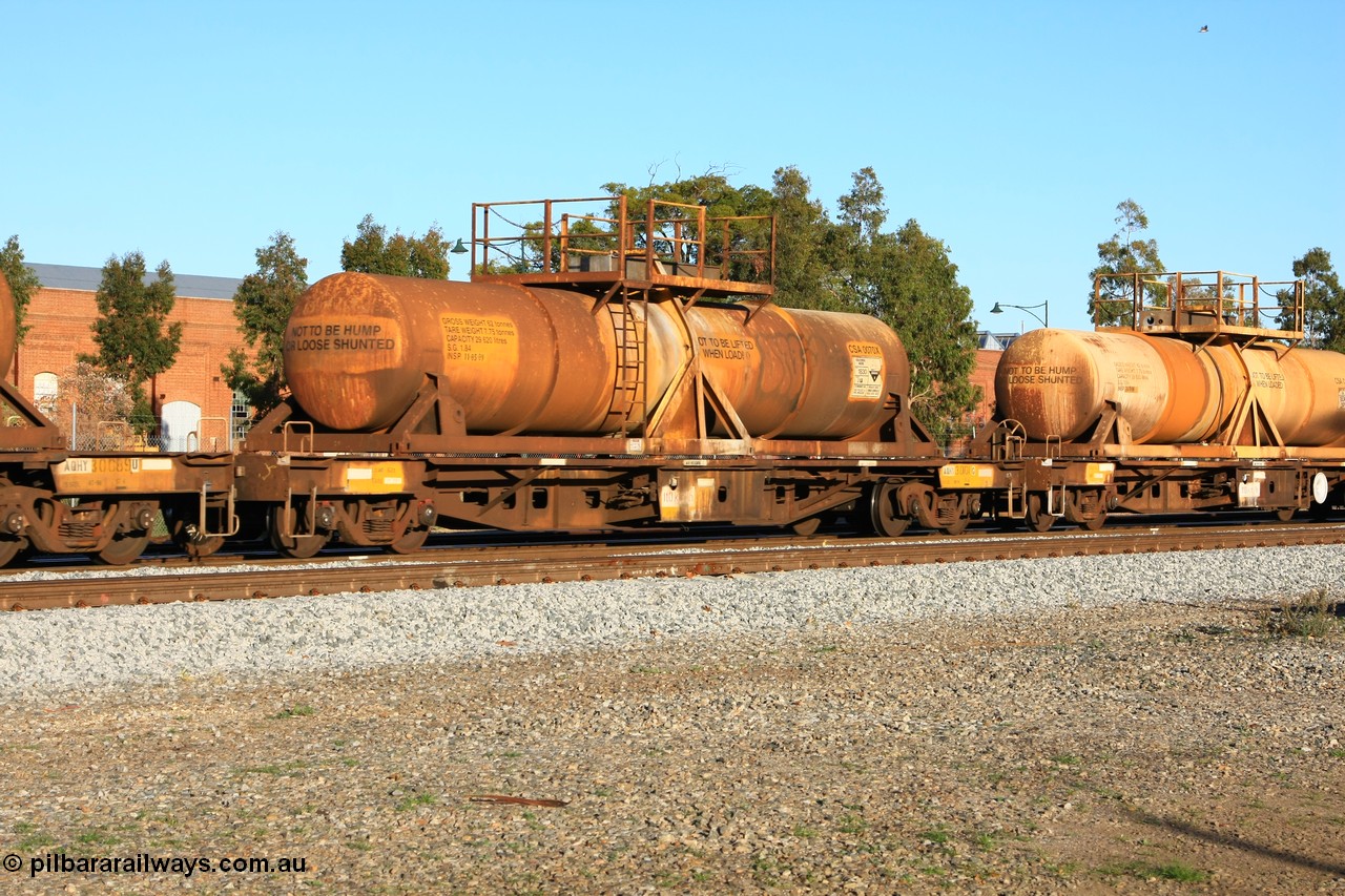 100609 09927
Midland, AQHY 30101 with sulphuric acid tank CSA 0070, originally built by the WAGR Midland Workshops in 1964/66 as a WF type flat waggon, then in 1997, following several recodes and modifications, was one of seventy five waggons converted to the WQH type to carry CSA sulphuric acid tanks between Hampton/Kalgoorlie and Perth/Kwinana.
Keywords: AQHY-type;AQHY30101;WAGR-Midland-WS;WF-type;WFDY-type;WFDF-type;RFDF-type;WQH-type;