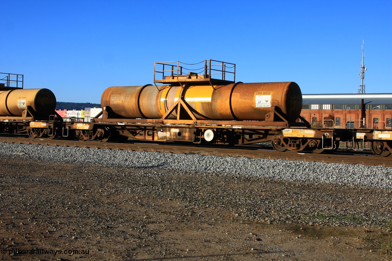 100609 09929
Midland, AQHY 30011 with sulphuric acid tank CSA 002, originally built by the WAGR Midland Workshops in 1964/66 as a WF type flat waggon, then in 1997, following several recodes and modifications, was one of seventy five waggons converted to the WQH type to carry CSA sulphuric acid tanks between Hampton/Kalgoorlie and Perth/Kwinana.
Keywords: AQHY-type;AQHY30011;WAGR-Midland-WS;WF-type;WFDY-type;WFDF-type;WQH-type;