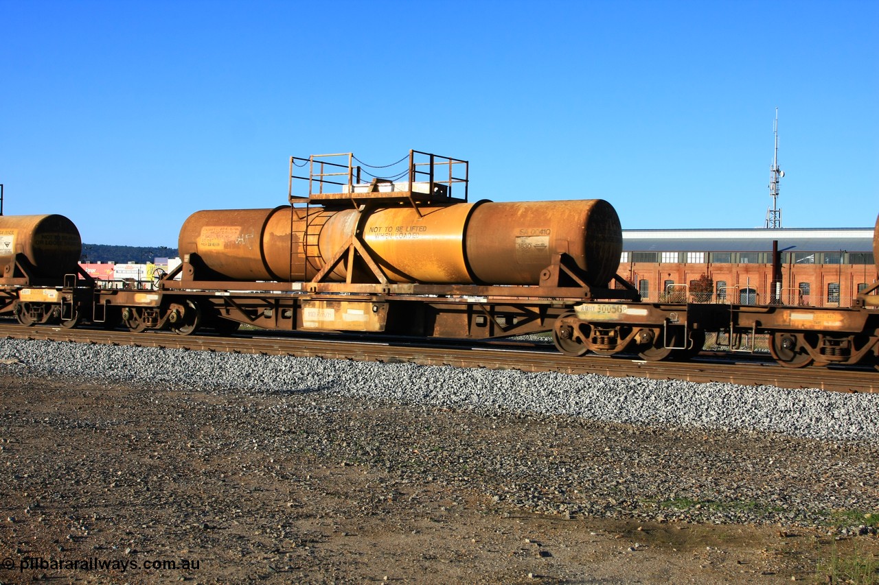 100609 09931
Midland, AQHY 30056 with sulphuric acid tank CSA 0041, originally built by the WAGR Midland Workshops in 1964/66 as a WF type flat waggon, then in 1997, following several recodes and modifications, was one of seventy five waggons converted to the WQH to carry CSA sulphuric acid tanks between Hampton/Kalgoorlie and Perth/Kwinana.
Keywords: AQHY-type;AQHY30056;WAGR-Midland-WS;WF-type;WFDY-type;WFDF-type;RFDF-type;WQH-type;