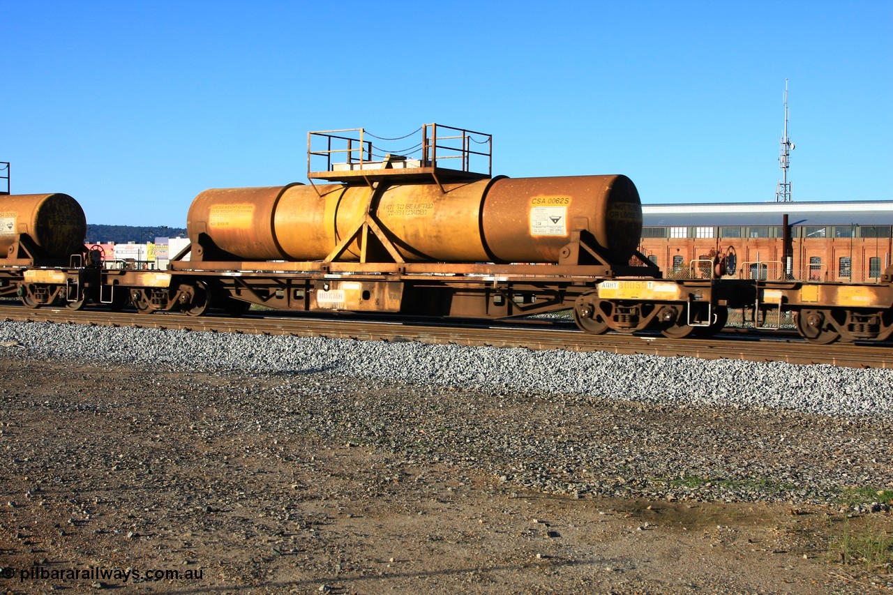 100609 09933
Midland, AQHY 30059 with sulphuric acid tank CSA 0062, originally built by the WAGR Midland Workshops in 1964/66 as a WF type flat waggon, then in 1997, following several recodes and modifications, was one of seventy five waggons converted to the WQH to carry CSA sulphuric acid tanks between Hampton/Kalgoorlie and Perth/Kwinana.
Keywords: AQHY-type;AQHY30059;WAGR-Midland-WS;WF-type;WFL-type;WFDY-type;WFDF-type;RFDF-type;WQH-type;