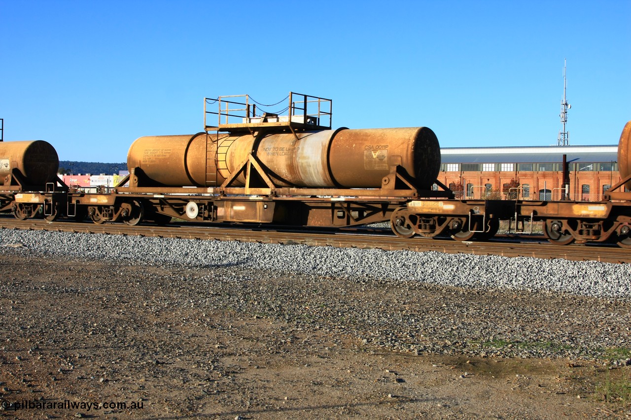 100609 09935
Midland, AQHY 30022 with sulphuric acid tank CSA 0011, originally built by the WAGR Midland Workshops in 1964/66 as a WF type flat waggon, then in 1997, following several recodes and modifications, was one of seventy five waggons converted to the WQH to carry CSA sulphuric acid tanks between Hampton/Kalgoorlie and Perth/Kwinana.
Keywords: AQHY-type;AQHY30022;WAGR-Midland-WS;WF-type;WMA-type;WFDY-type;WFDF-type;RFDF-type;WQH-type;