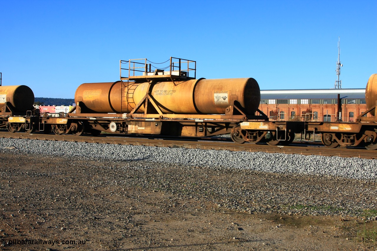 100609 09936
Midland, AQHY 30004 with sulphuric acid tank CSA 0015, originally built by the WAGR Midland Workshops in 1964/66 as a WF type flat waggon, then in 1997, following several recodes and modifications, was one of seventy five waggons converted to the WQH to carry CSA sulphuric acid tanks between Hampton/Kalgoorlie and Perth/Kwinana.
Keywords: AQHY-type;AQHY30004;WAGR-Midland-WS;WF-type;WFDY-type;WFDF-type;RFDF-type;WQH-type;