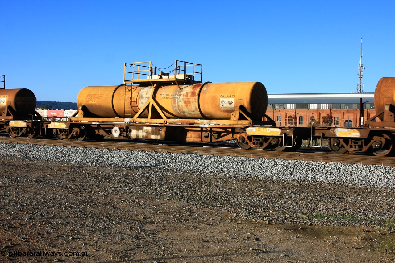 100609 09939
Midland, AQHY 30076 with sulphuric acid tank CSA 0040, originally built by the WAGR Midland Workshops in 1964/66 as a WF type flat waggon, then in 1997, following several recodes and modifications, was one of seventy five waggons converted to the WQH to carry CSA sulphuric acid tanks between Hampton/Kalgoorlie and Perth/Kwinana.
Keywords: AQHY-type;AQHY30076;WAGR-Midland-WS;WF-type;WFDY-type;WFDF-type;WQH-type;