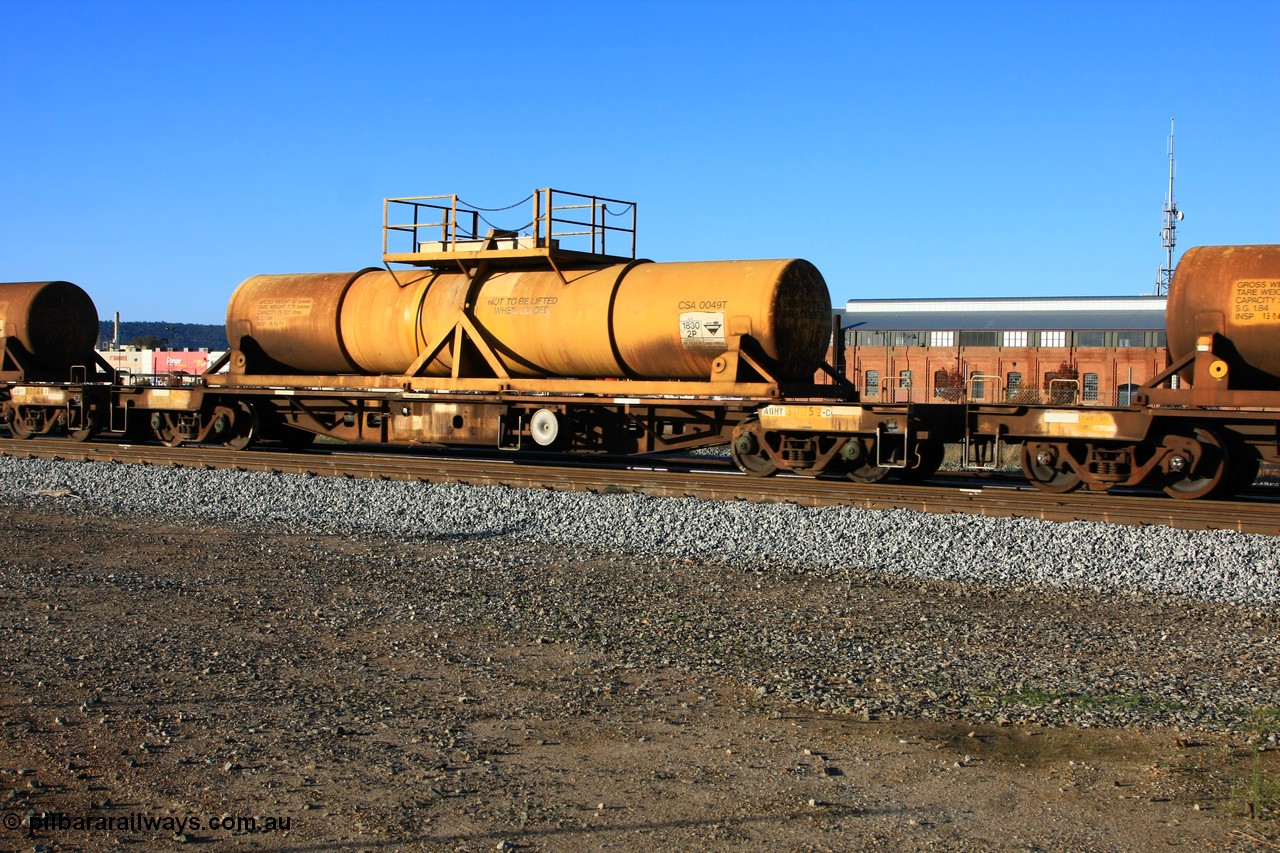 100609 09942
Midland, AQHY 30052 with sulphuric acid tank CSA 0049, originally built by the WAGR Midland Workshops in 1964/66 as a WF type flat waggon, then in 1997, following several recodes and modifications, was one of seventy five waggons converted to the WQH to carry CSA sulphuric acid tanks between Hampton/Kalgoorlie and Perth/Kwinana.
Keywords: AQHY-type;AQHY30052;WAGR-Midland-WS;WF-type;WFDY-type;WFDF-type;RFDF-type;WQH-type;