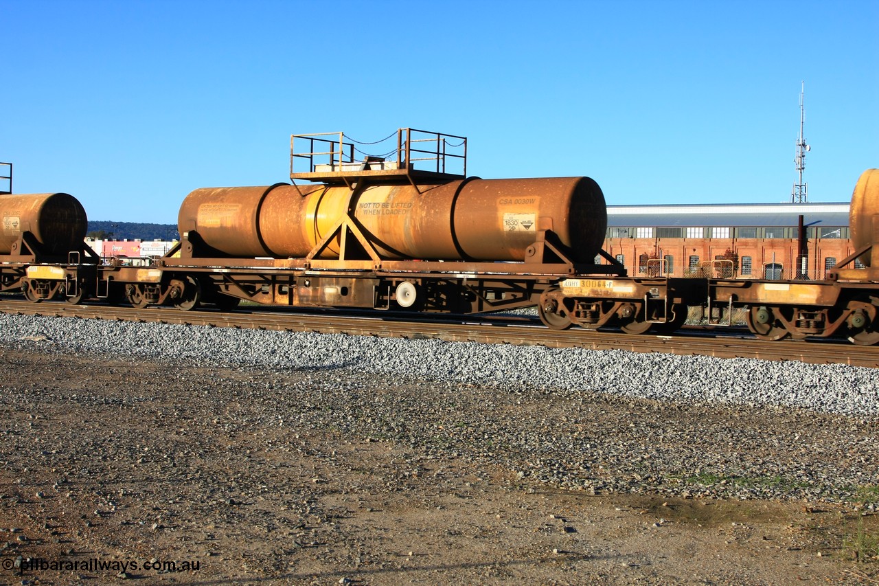 100609 09943
Midland, AQHY 30064 with sulphuric acid tank CSA 0030, originally built by the WAGR Midland Workshops in 1964/66 as a WF type flat waggon, then in 1997, following several recodes and modifications, was one of seventy five waggons converted to the WQH to carry CSA sulphuric acid tanks between Hampton/Kalgoorlie and Perth/Kwinana.
Keywords: AQHY-type;AQHY30064;WAGR-Midland-WS;WF-type;WFDY-type;WFDF-type;RFDF-type;WQH-type;