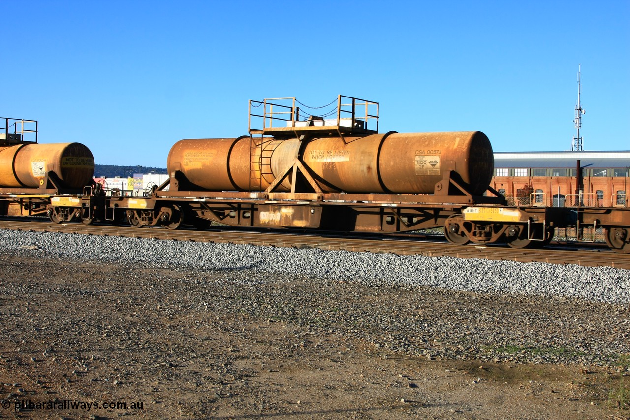 100609 09944
Midland, AQHY 30099 with sulphuric acid tank CSA 0057, originally built by the WAGR Midland Workshops in 1964/66 as a WF type flat waggon, then in 1997, following several recodes and modifications, was one of seventy five waggons converted to the WQH to carry CSA sulphuric acid tanks between Hampton/Kalgoorlie and Perth/Kwinana.
Keywords: AQHY-type;AQHY30099;WAGR-Midland-WS;WF-type;WFDY-type;WFDF-type;RFDF-type;WQH-type;