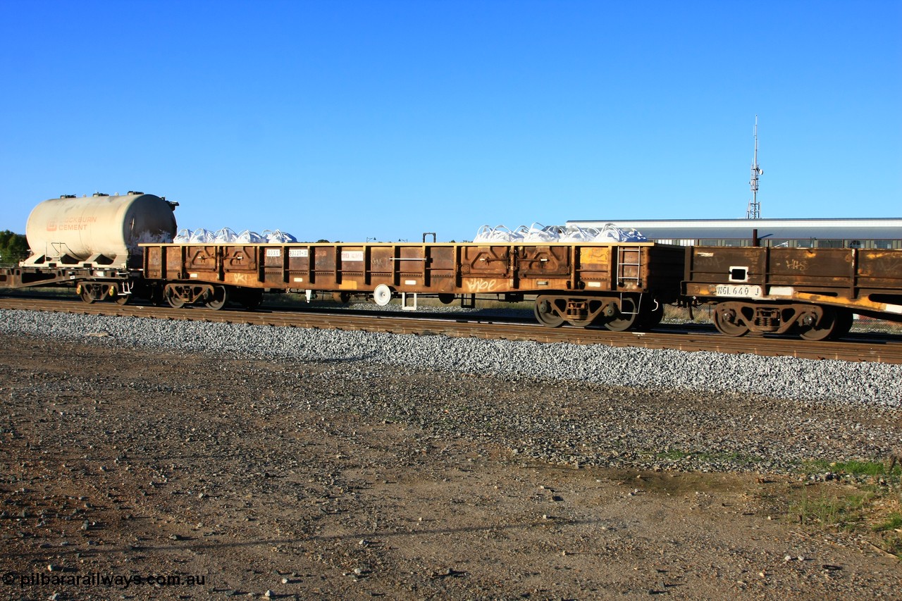 100609 09949
Midland, AOXY 33221, converted to carry nickel matte bulk bags, in WGL traffic. Built by WAGR Midland Workshops in 1973 as part of a batch of twenty five WGX type open waggons, in 1981 to WOAX, then AOAY type.
Keywords: AOXY-type;AOXY33221;WAGR-Midland-WS;WGX-type;WOAX-type;