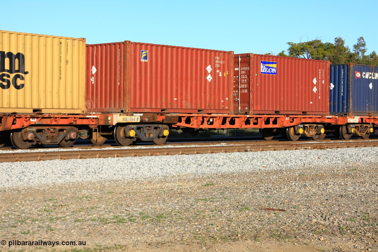 100609 09970
Midland, AQRY 1004 two-pack platform A loaded with two 20' Florens and Beacon 22G1 type containers carrying lead, FSCU 393712 and BM0U 217572. The AQRY are a bar-coupled pair and were used for rail transport as the AFRF type on the Darwin line and are originally former ANR-CR waggons.
Keywords: AQRY-type;AQRY1004;AFRF-type;