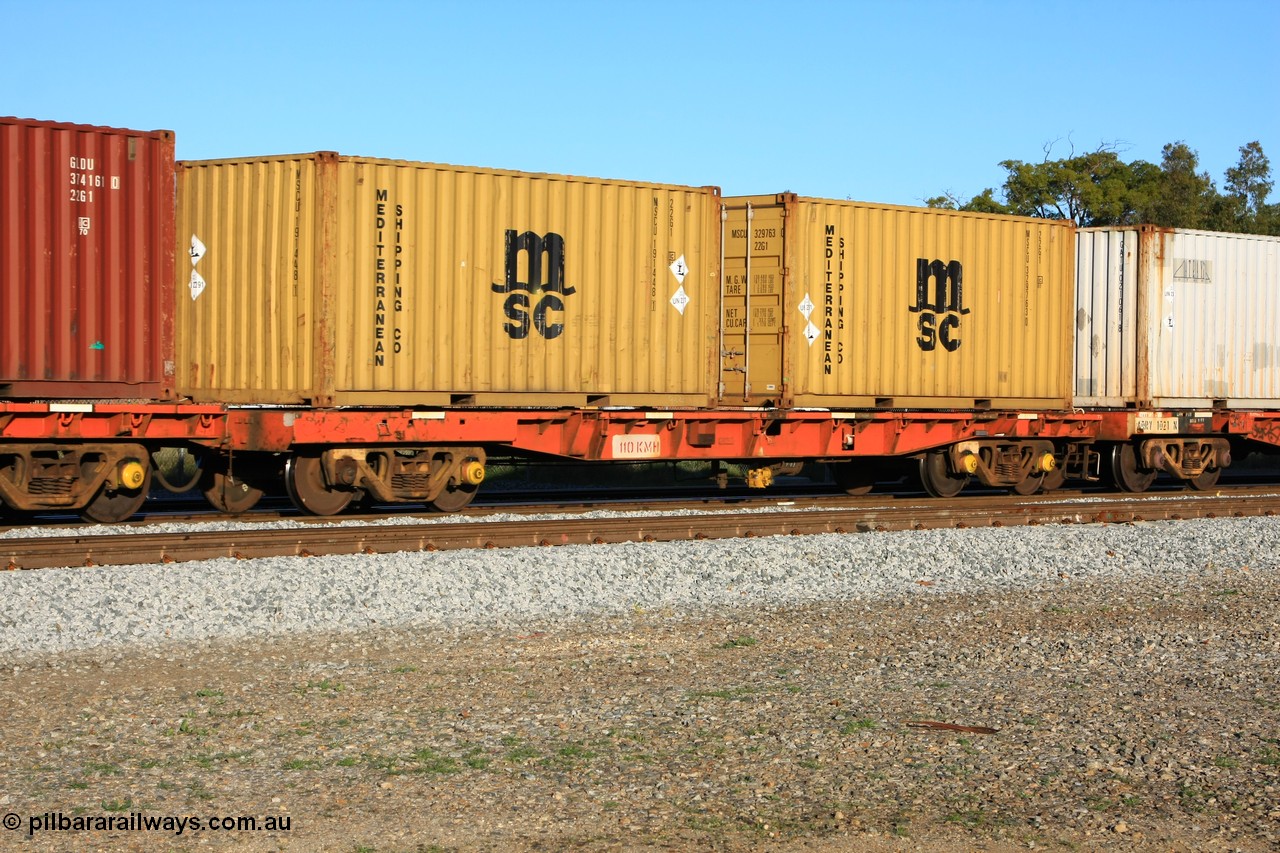 100609 09975
Midland, AQRY 1023 two-pack platform B loaded with two 20' Mediterranean Shipping 22G1 type boxes containing lead, MSCU 191448 and MSCU 329763. The AQRY are a bar-coupled pair and were used for rail transport as the AFRF type on the Darwin line and are originally former ANR-CR waggons.
Keywords: AQRY-type;AQRY1023;AFRF-type;