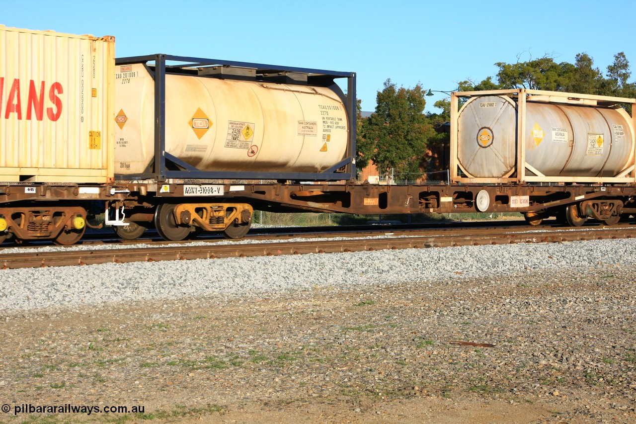 100609 09979
Midland, AQWY 31008 container flat waggon originally built by Westrail Midland Workshops in 1981 part of a batch of eighteen as WFA type, carrying two 20' Tank Containers Australia 22T6 type tanktainers TCAU 201006 and TCAU 121002 empty ammonium nitrate.
Keywords: AQWY-type;AQWY31008;Westrail-Midland-WS;WFA-type;WQCY-type;RHQY-type;