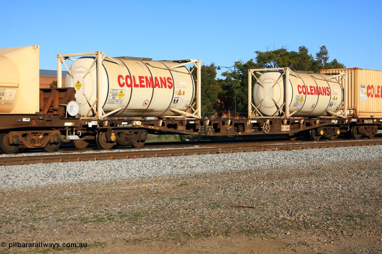 100609 09983
Midland, AQCY 30242 container flat waggon built by WAGR Midland Workshops in a batch of forty five WFX type container flats in 1974, recoded to WQCX in 1980. Loaded two 20' Colemans' 22T6 tanktainers empty for ammonium nitrate CCTU 500006 and CCTU 500002.
Keywords: AQCY-type;AQCY30242;WAGR-Midland-WS;WFX-type;WQCX-type;