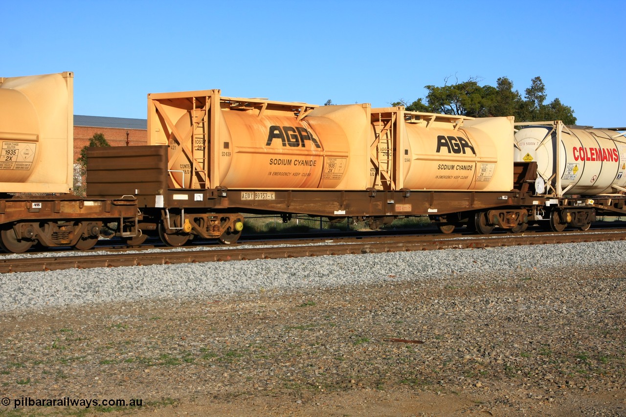 100609 09984
Midland, AZDY 30757, one of about fourteen WBAX vans converted to AZDY type sodium cyanide container waggon, originally built by WAGR Midland Workshops as one of seventy five WV/X type covered vans in 1967-68, converted late 1988/9 to WQDF. With two empty AGR tanktainers SD 639 and SD 648.
Keywords: AZDY-type;AZDY30757;WAGR-Midland-WS;VWV-type;WVX-type;WBAX-type;WQDF-type;