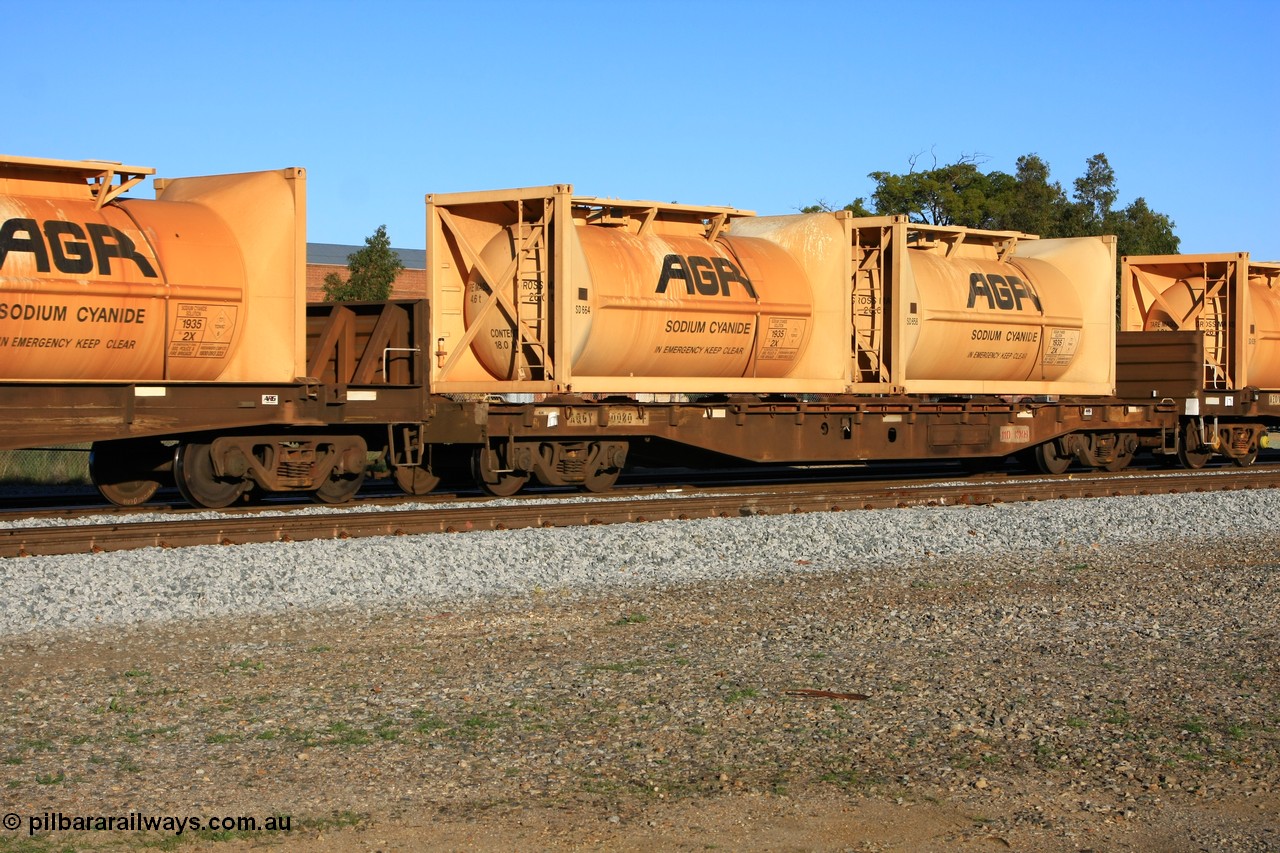 100609 09985
Midland, AQGY 30080 flat waggon, originally built by WAGR Midland Workshops in a batch of one hundred and nineteen flat waggons as WF type in 1964-66, recoded to WFDY in 1979, WFDF in 1988 and WFBY in 1990. Loaded with two empty AGR sodium cyanide tanktainers SD 664 and SD 658.
Keywords: AQGY-type;AQGY30080;WAGR-Midland-WS;WF-type;WFDY-type;WFDF-type;WFBY-type;