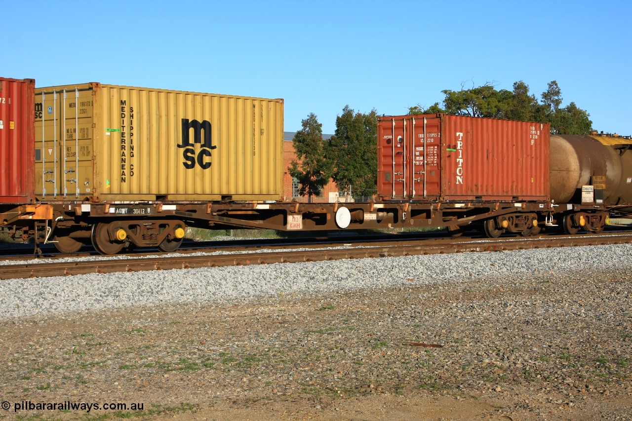 100609 10012
Midland, AQWY 30412 container waggon originally one of one hundred and sixty one built by Tomlinson Steel in 1970 as WFX type, to WQCX in 1989, to WQA in 1995 and WQTY in c1996. Loaded with two 20' containers for Mediterranean Shipping MEDU 196173 type 22G1 and Triton TRIU 155955 a type 2210.
Keywords: AQWY-type;AQWY30412;Tomlinson-Steel-WA;WFX-type;WQCX-type;WQA-type;WQTY-type;