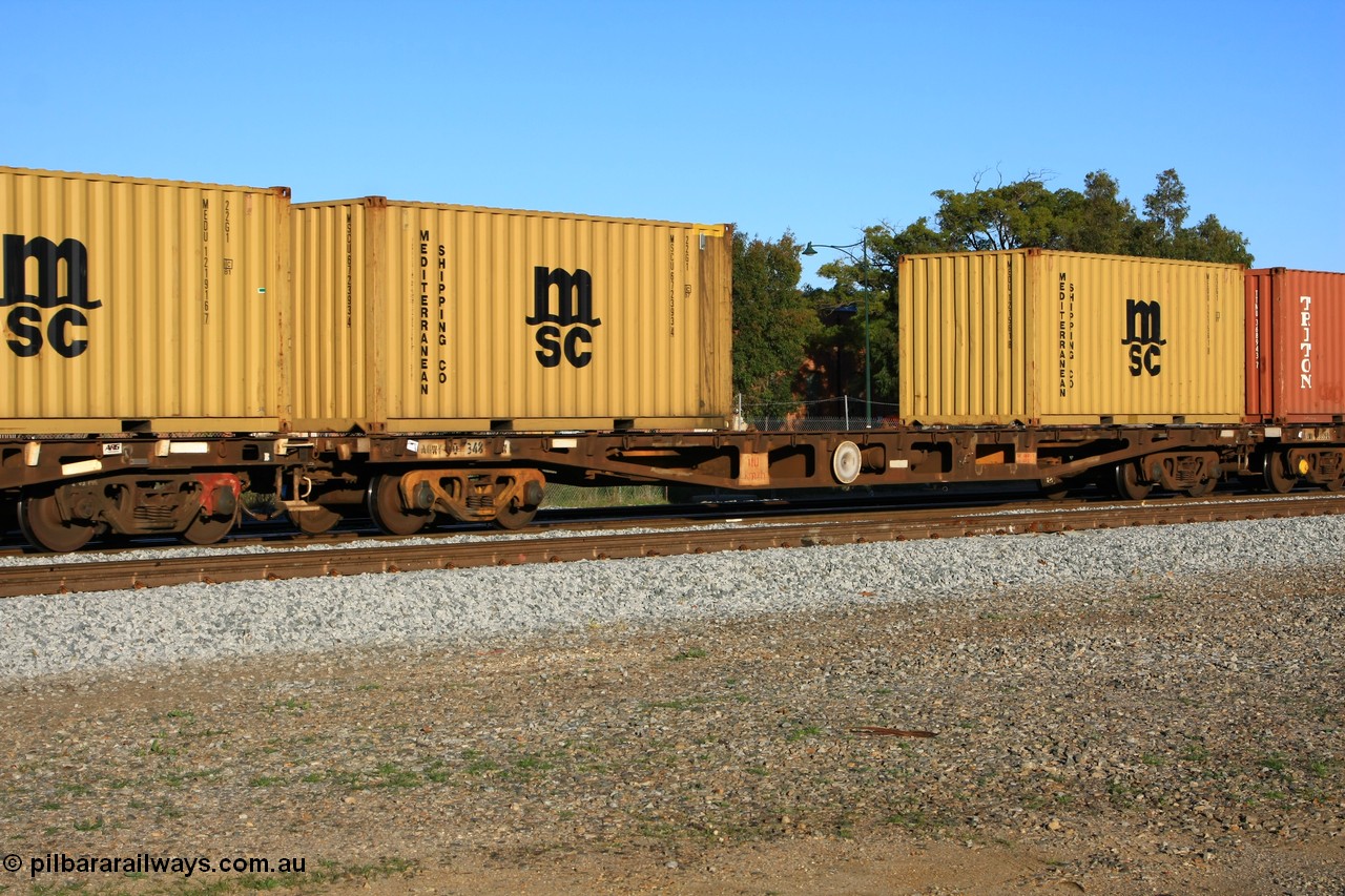 100609 10015
Midland, AQWY 30348 container flat waggon built by Tomlinson Steel WA as WFX type in 1970 from a batch of one hundred and sixty one waggons, to narrow gauge as QWF type in 1970, back to SG in 1972 as WFX, recoded in 1979 to WQCX type. Loaded with two 20' Mediterranean Shipping 22G1 type containers MSCU 672393 and MEDU 121561.
Keywords: AQWY-type;AQWY30348;Tomlinson-Steel-WA;WFX-type;QWF-type;WQCX-type;