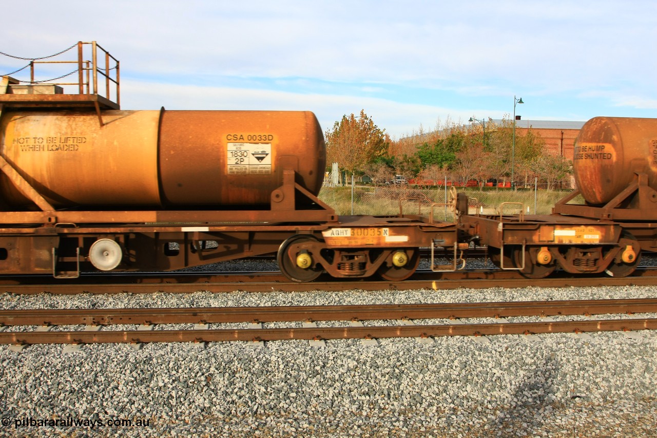 100611 0313
Midland, AQHY 30035 with sulphuric acid tank CSA 0033, originally built by the WAGR Midland Workshops in 1964/66 at WF type flat waggons, then following several codes and modifications in 1997 seventy five were converted to WQH to carry CSA sulphuric acid tanks between Hampton/Kalgoorlie and Perth/Kwinana.
Keywords: AQHY-type;AQHY30035;WAGR-Midland-WS;WF-type;WFM-type;WFDY-type;WFDF-type;RFDF-type;WQH-type;